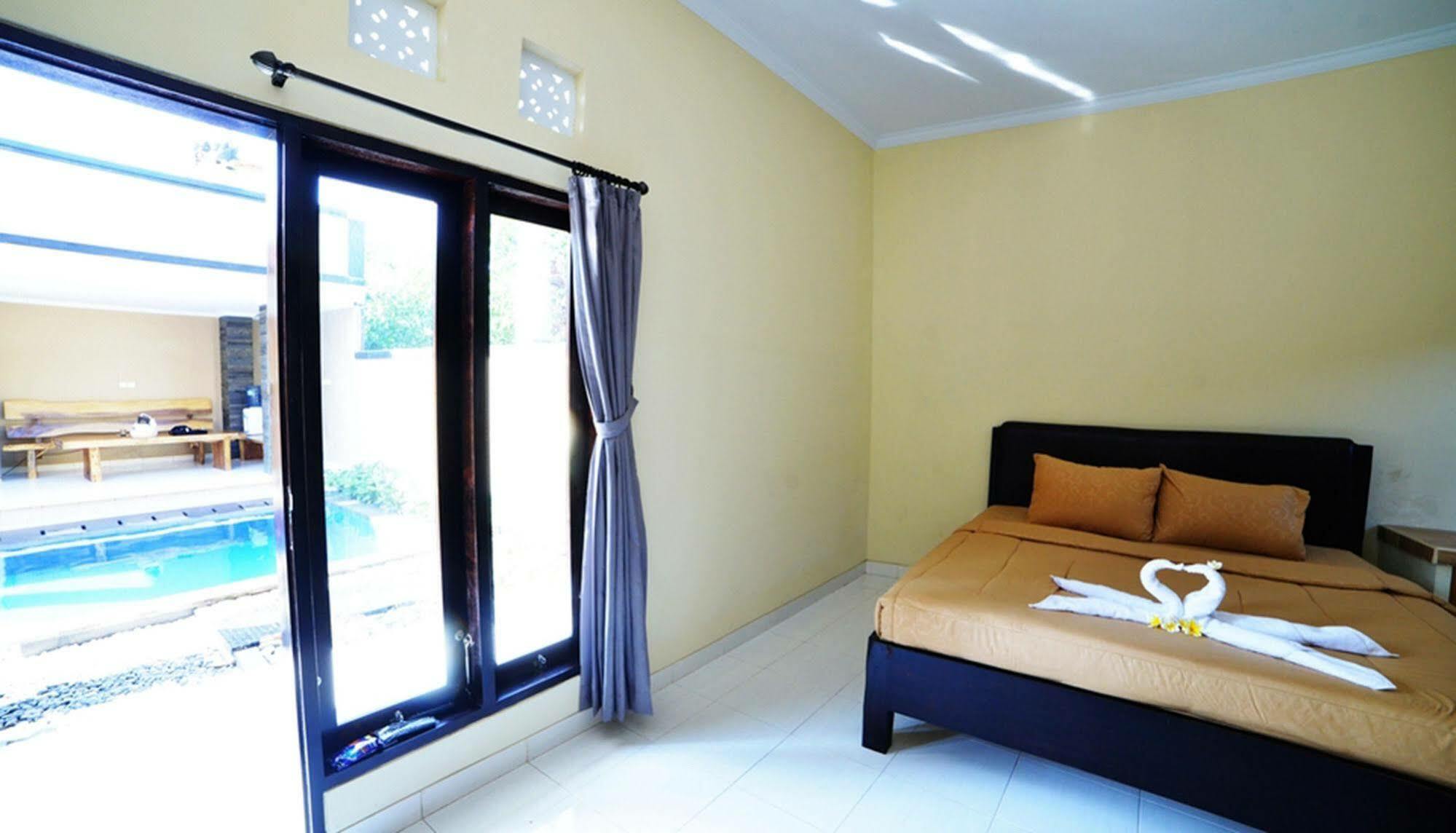 Ratu Guest House Kuta Selatan Ngoại thất bức ảnh